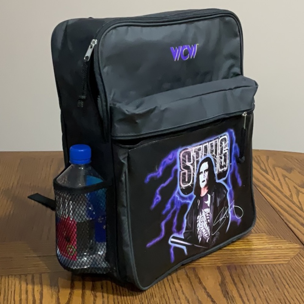 STING black backpack with water bottle holder & extra compartment in front NWOT